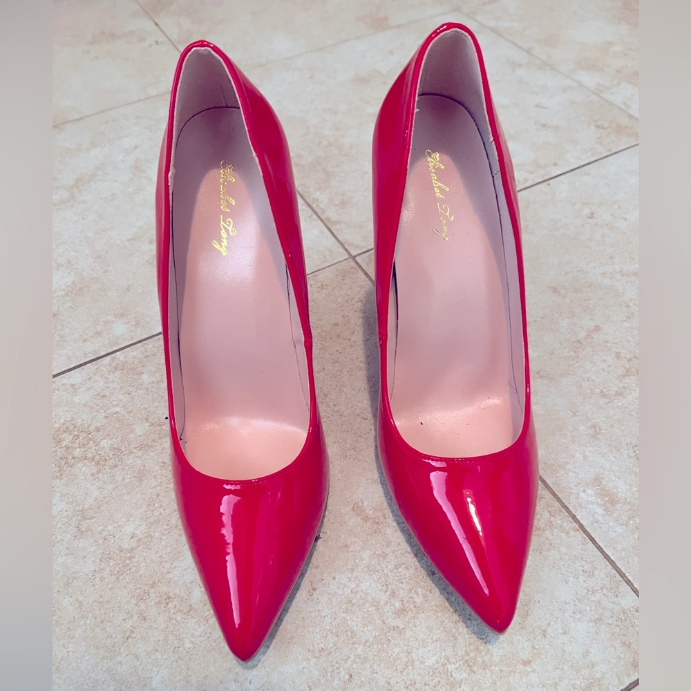 carmela patent leather bow & tassel red sole pumps
